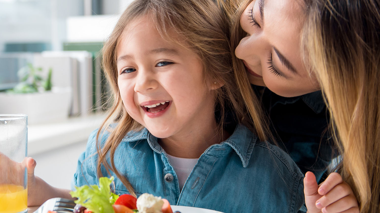 Mother and Daughter with salad